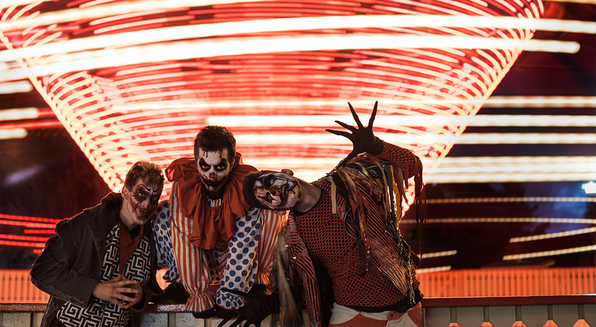 Scary clowns roaming the park during the Halloween Event